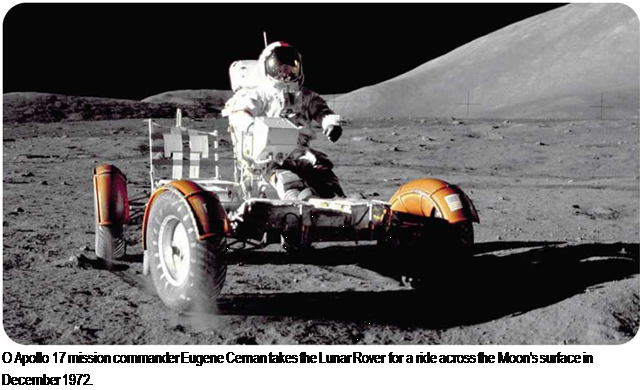 Подпись: О Apollo 17 mission commander Eugene Cernan takes the Lunar Rover for a ride across the Moon's surface in December 1972. 