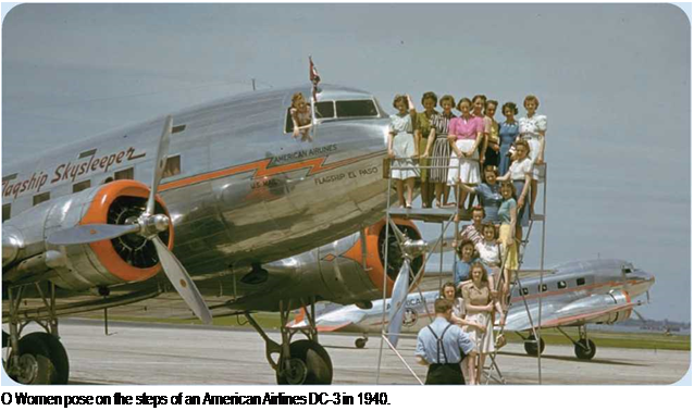 Подпись: О Women pose on the steps of an American Airlines DC-3 in 1940. 