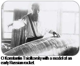 Подпись: О Konstantin Tsiolkovsky with a model of an early Russian rocket. 