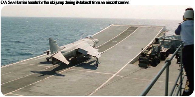 Подпись: О A Sea Harrier heads for the ski jump during its takeoff from an aircraft carrier. 