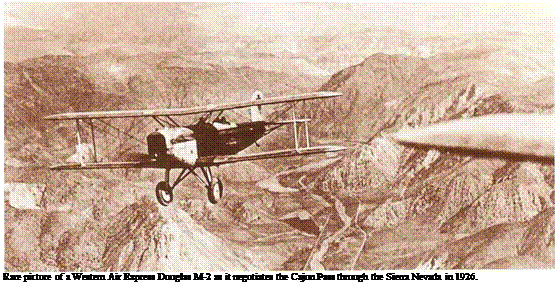 Подпись: Rare picture of a Western Air Express Douglas M-2 as it negotiates the Cajon Pass through the Sierra Nevada in 1926. 