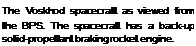 Подпись: The Voskhod spacecraft as viewed from the BPS. The spacecraft has a back-up solid-propellant braking rocket engine.