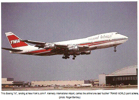 Подпись: This Boeing 747, landing at New York’s John F. Kennedy International Airport, carries the airline’s revised “outline” TRANS WORLD paint scheme, (photo: Roger Bentley) 
