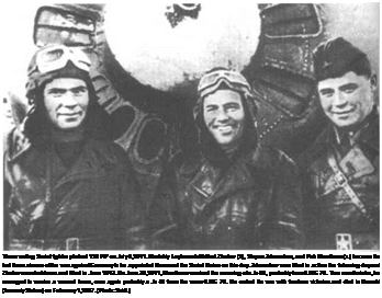 Подпись: Three smiling Soviet fighter pilots of 158 IAP on July 8,1941. Mladshiy Leytenants Mikhail Zhukov (I.), Stepan Zdorovtsev, and Petr Kharitonov(r.) became the first three airmen of the war against Germany to be appointed Heroes of the Soviet Union on this day. Zdorovtsev was killed in action the following day and Zhukov was shot down and killed in June 1943. On June 28,1941, Kharitonov survived the ramming of a Ju 88, probably from 6J KG 76. Two months later, he managed to survive a second taran, once again probably a Ju 88 from the same 6./KG 76. He ended the war with fourteen victories and died in Donetsk (formerly Stalino) on February 1,1987. (Photo: Seidl.) 