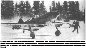 Подпись: A LaGG-3 armed with RS-82 rocket projectiles taxis out on a snow-covered airfield. During the period of the final German advance against Moscow, repeated nightly snowfalls, followed by rises in the temperature and resultant thaws, posed an enormous problem for Luftwaffe units operating from primitive airstrips close to the front line. In stark contrast, the WS enjoyed the advantage of operating from well-equipped airdromes with concrete runways. (Photo: Voronin.) 